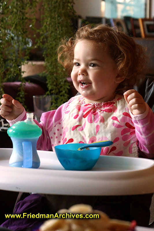 high chair,two,toddler,girl,baby,smiling,good light,portrait,